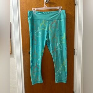 Disney Parks Turquoise Capri Leggings with Castle Print